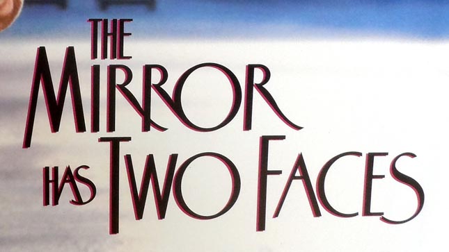 LOGO THE MIRROR HAS TWO FACES